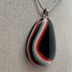 Glass art red black and white silvertone pendant necklace